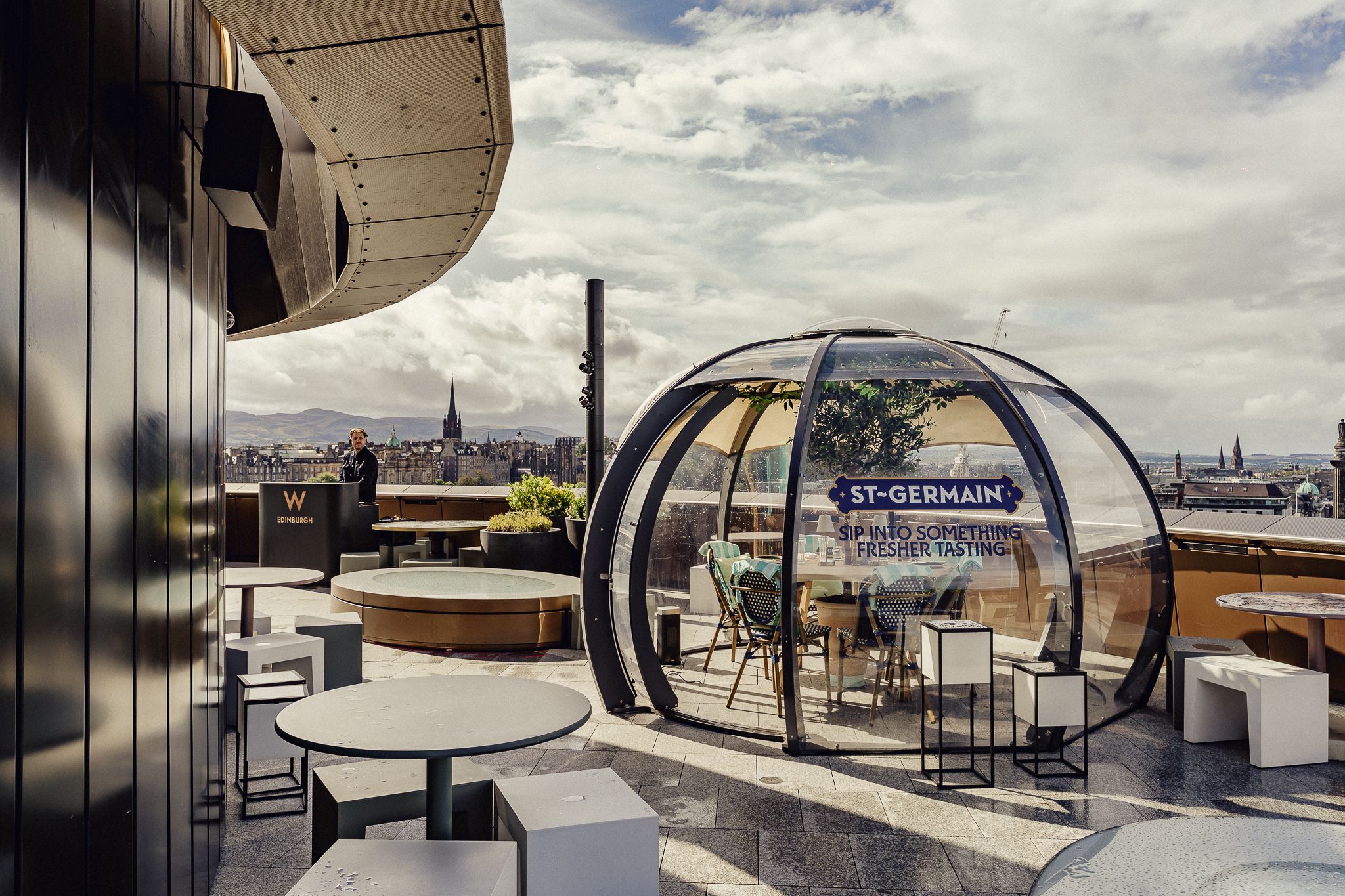 Hotel rooftop with dressed dining pod
