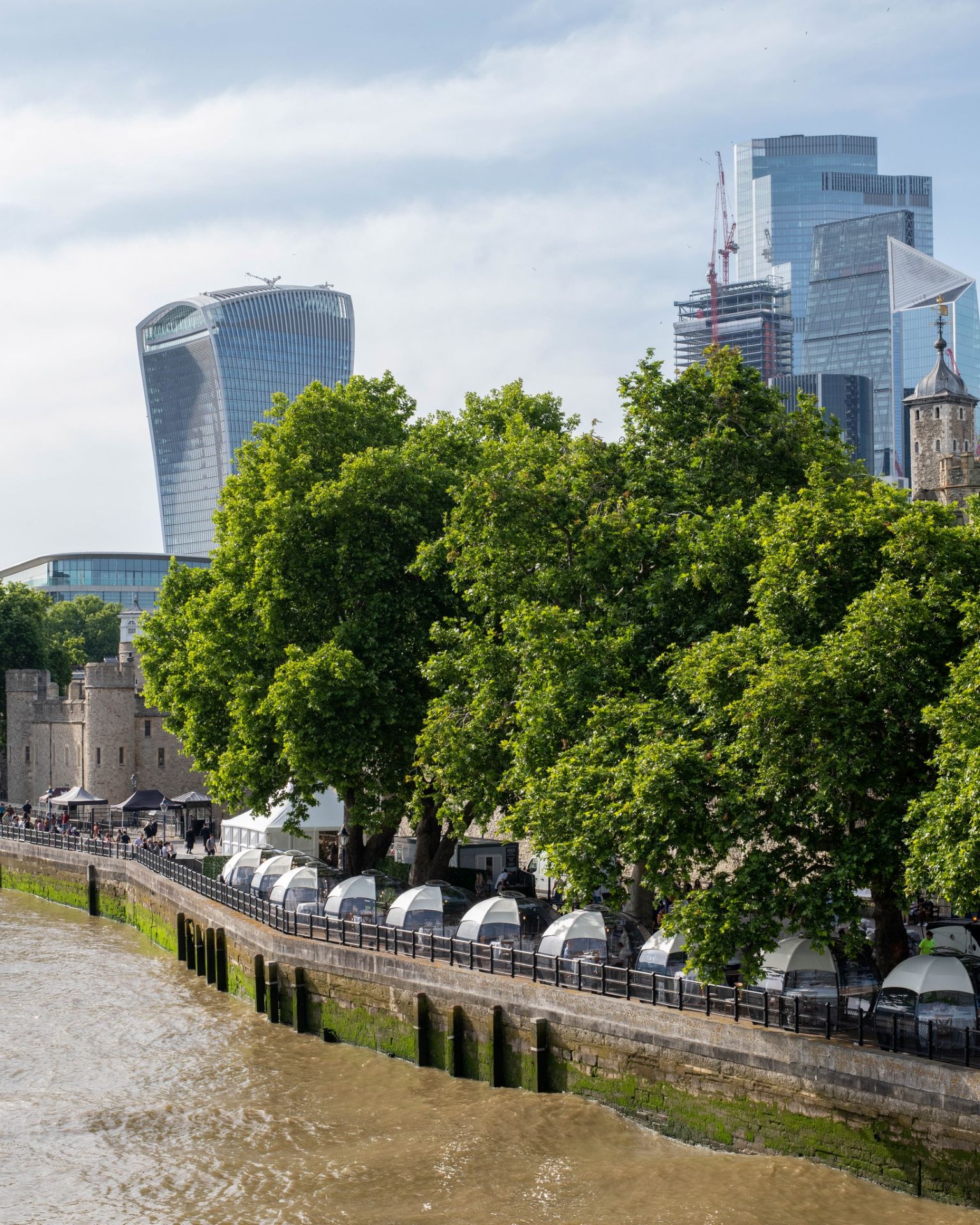 Seasonal event dining pods by the River Thames in London