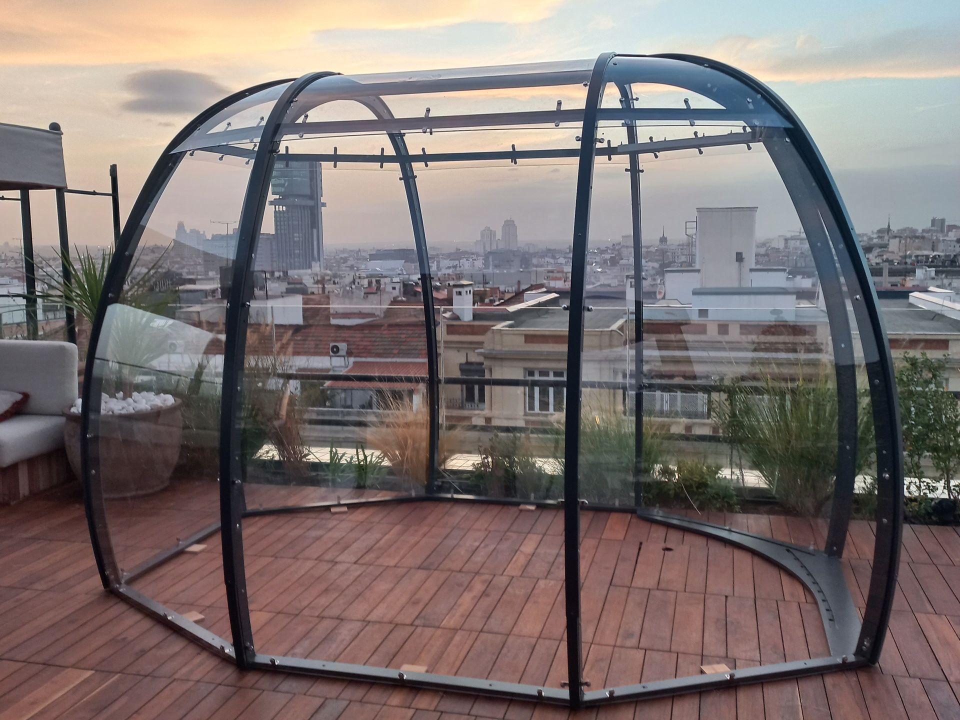 The shell of a small dining pod being installed 