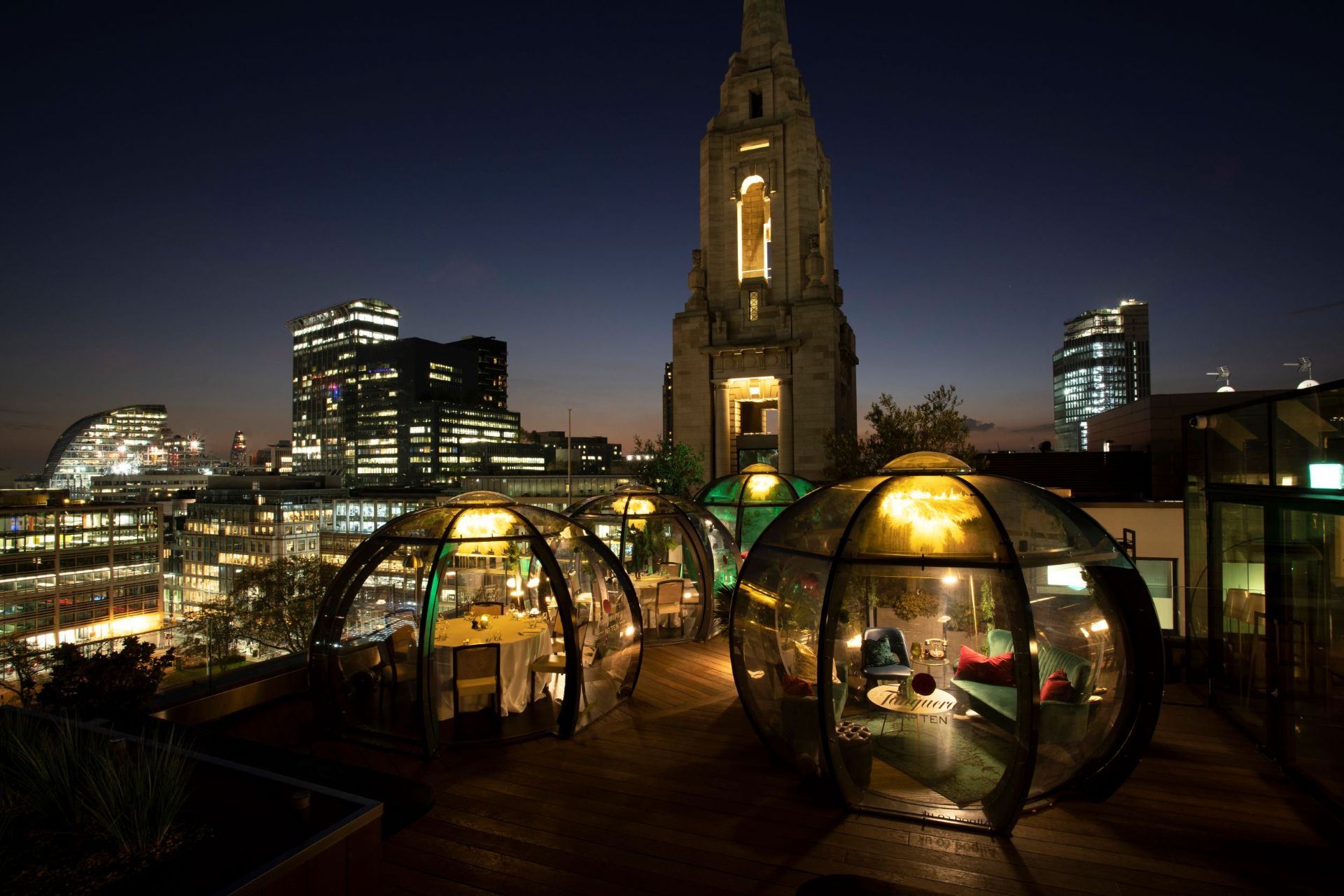 Aviary dining pods at night